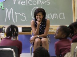 MICHELLE OBAMA with Students at Ferebee-Hope Elementary School, Photo from Business Insider